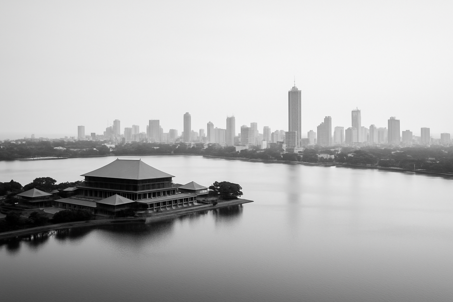 Black-and-white aerial view of Colombo’s central cityscape.