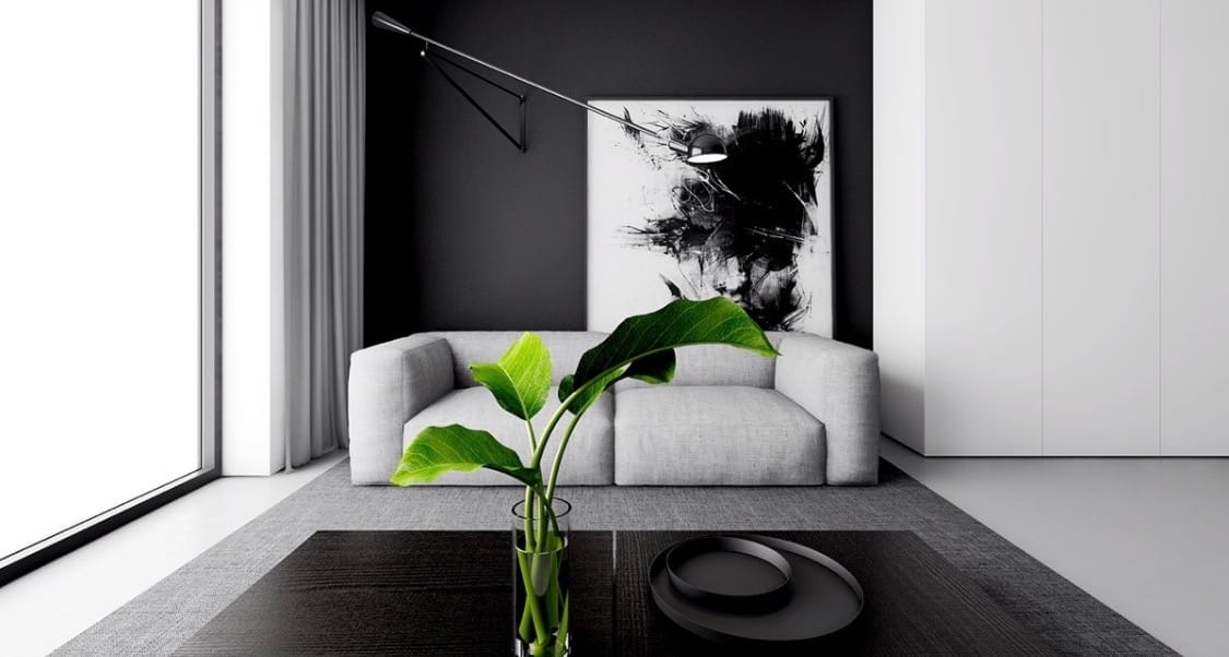Minimalist interior with soft natural light, modern furniture, abstract art, and a green plant.